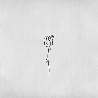 Flower tattoo with a long stem in a minimalist style.