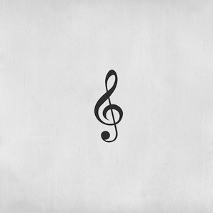 Treble clef music tattoo