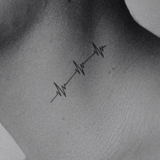 Tattoo of 3 electrical symbols of energy