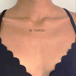 Tattoo: Writing "be yourself"