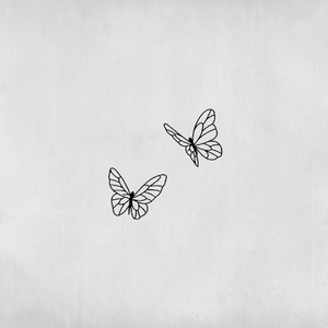 Tattoo of 2 butterflies in flight