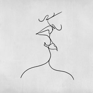 Tatouage Deux visages qui s’embrasent d’un trait minimaliste