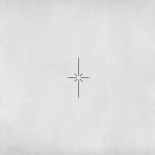 Asymmetrical star tattoo that sparkles with a minimalist line.
