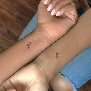 Tatouage Symbole de l'envie d’un trait minimaliste