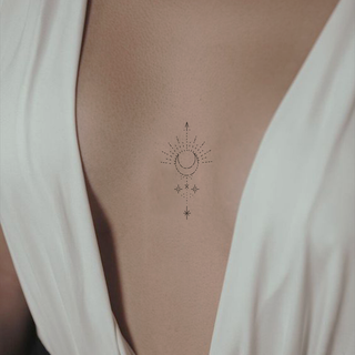 Minimalist dotted line symbol tattoo.