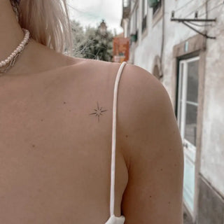 Tatouage Étoile qui scintille minimaliste