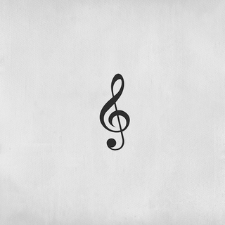 Treble clef music tattoo