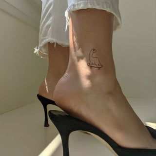 Tatouage Dinosaure tortue sur un skateboard