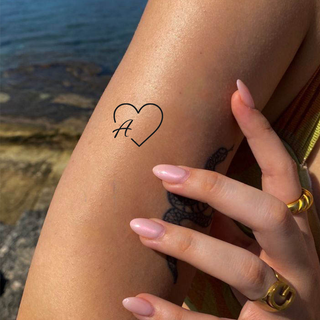 Tatouage Coeur avec lettre